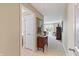 Upstairs hallway with hardwood floors, furniture, and natural light streaming through the windows at 16502 Grand Cypress Dr, Noblesville, IN 46060
