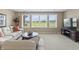 Finished basement living room with golf course views from the large window at 16502 Grand Cypress Dr, Noblesville, IN 46060