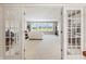 Finished basement with French doors leading to living and office space with golf course views at 16502 Grand Cypress Dr, Noblesville, IN 46060