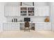 Bright office featuring custom cabinetry, built-in shelving, and dedicated desk space at 16502 Grand Cypress Dr, Noblesville, IN 46060