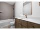 Bathroom showcasing a tub with stylish gray tiling, a modern vanity with bronze hardware and light countertops at 1664 Carrollton Rail Dr, Westfield, IN 46074