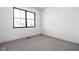 Serene bedroom with a large window, neutral carpeting, and ample natural light, perfect for a relaxing atmosphere at 1664 Carrollton Rail Dr, Westfield, IN 46074