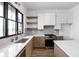 Well-appointed kitchen with modern appliances, sleek countertops, and ample storage space, creating a functional and stylish area at 1664 Carrollton Rail Dr, Westfield, IN 46074