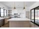 Kitchen with white countertops, stainless steel appliances, and designer lighting at 1664 Carrollton Rail Dr, Westfield, IN 46074