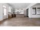 Spacious open-concept area featuring a modern kitchen with stainless steel appliances and a large island at 1664 Carrollton Rail Dr, Westfield, IN 46074