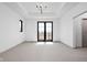 Bright, airy living room with tray ceilings and double doors leading to a balcony at 1664 Carrollton Rail Dr, Westfield, IN 46074
