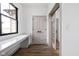 The light-filled office boasts a built-in desk area and adjacent closet/storage space offering the perfect work-from-home setup at 1664 Carrollton Rail Dr, Westfield, IN 46074