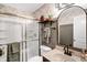 A clean bathroom with a glass enclosed shower, updated vanity, and a decorative shelf at 1664 Woodside Cir, Franklin, IN 46131