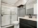 Bathroom with a glass-enclosed shower, a vanity with modern fixtures and decor at 1664 Woodside Cir, Franklin, IN 46131