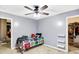 Neutral bedroom with carpet and ceiling fan at 1664 Woodside Cir, Franklin, IN 46131