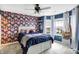 Primary bedroom with stylish floral wallpaper and a hammock at 1664 Woodside Cir, Franklin, IN 46131