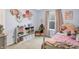 bedroom with a colorful style and a light blue paint at 1664 Woodside Cir, Franklin, IN 46131