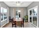 Dining room with natural lighting, neutral tones, and hardwood floors at 1664 Woodside Cir, Franklin, IN 46131