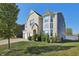Lovely two-story home with well-manicured lawn and beautiful mature tree at 1664 Woodside Cir, Franklin, IN 46131
