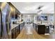 Beautiful kitchen features stainless steel appliances, granite countertops, and hardwood floors at 1664 Woodside Cir, Franklin, IN 46131