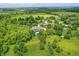 High-angle view of the area showing the beautiful residence, large trees, and serene landscape at 20170 Starlight Ct, Noblesville, IN 46062