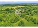 Drone shot of the property highlighting the home, lush greenery, and nearby amenities at 20170 Starlight Ct, Noblesville, IN 46062