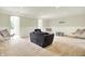 Spacious finished basement with neutral carpeting, natural light and comfortable seating area at 20170 Starlight Ct, Noblesville, IN 46062
