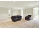 Spacious finished basement with neutral carpeting and comfortable seating area at 20170 Starlight Ct, Noblesville, IN 46062