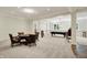 Open finished basement with a game table, pool table, classic bar stools, and lots of entertaining space at 20170 Starlight Ct, Noblesville, IN 46062