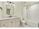 Bright bathroom with white subway tile, marble floors, and vanity with marble countertop at 20170 Starlight Ct, Noblesville, IN 46062