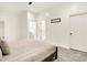 Bright bedroom features carpet, neutral colors, and two doors to other rooms at 20170 Starlight Ct, Noblesville, IN 46062