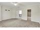 Spacious bedroom with open layout, offering multiple entryways and ensuite bathroom at 20170 Starlight Ct, Noblesville, IN 46062