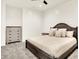 Bedroom boasts a neutral color palette, dark wood bed, carpet and classic furniture at 20170 Starlight Ct, Noblesville, IN 46062