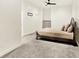 Bedroom features neutral color scheme, carpet, ceiling fan, and a tv mount on the wall at 20170 Starlight Ct, Noblesville, IN 46062