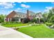 Beautiful brick and stone home with manicured landscaping and inviting curb appeal at 20170 Starlight Ct, Noblesville, IN 46062