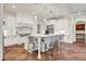 Bright kitchen with large island and seating, stainless steel appliances, and pendant lighting at 20170 Starlight Ct, Noblesville, IN 46062