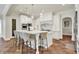 Bright kitchen with large island and seating, stainless steel appliances, and pendant lighting at 20170 Starlight Ct, Noblesville, IN 46062