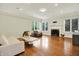 Spacious living room with hardwood floors, a fireplace, and lots of natural light at 20170 Starlight Ct, Noblesville, IN 46062