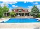 Stunning in-ground pool with slide and automatic cover, complemented by the backyard and home at 20170 Starlight Ct, Noblesville, IN 46062