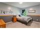 Comfortable bedroom featuring a cozy bed, natural light, and relaxing decor at 24 Cinnamon Ct, Brownsburg, IN 46112