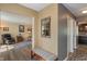Inviting foyer with wood flooring, a decorative mirror, and a view into the living areas at 24 Cinnamon Ct, Brownsburg, IN 46112