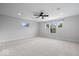 Spacious bedroom with carpet, ceiling fan, recessed lighting, and natural light from multiple windows at 2448 Broadway St, Indianapolis, IN 46205