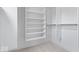 Walk-in closet features white shelving and racks at 2448 Broadway St, Indianapolis, IN 46205