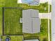 Aerial view of the home's roof, fenced backyard and mature trees, illustrating property boundaries at 2626 Solidago Dr, Plainfield, IN 46168