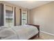 Bedroom featuring neutral walls, carpet, and natural light from two windows at 2626 Solidago Dr, Plainfield, IN 46168
