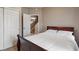 Cozy bedroom with warm lighting and staircase access at 2626 Solidago Dr, Plainfield, IN 46168