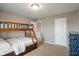 Bedroom with carpet, bunk beds, storage shelves and neutral paint at 2626 Solidago Dr, Plainfield, IN 46168