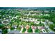 Neighborhood aerial view shows manicured lawns and established trees, creating a serene setting at 286 N Greenbriar Dr, Greenwood, IN 46142