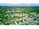 Scenic aerial shot showcasing a quiet residential area with a water tower and homes surrounded by greenery at 286 N Greenbriar Dr, Greenwood, IN 46142