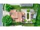 Bird's eye view showcases a well-maintained home with a backyard pool, deck and mature trees at 286 N Greenbriar Dr, Greenwood, IN 46142