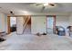 Finished basement space with carpet, stairs, and multiple entrances at 286 N Greenbriar Dr, Greenwood, IN 46142