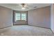 Spacious bedroom with neutral carpet and a window with natural light at 286 N Greenbriar Dr, Greenwood, IN 46142