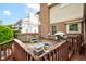 Wooden deck with hot tub, grill, gazebo, brick chimney, and outdoor seating area at 286 N Greenbriar Dr, Greenwood, IN 46142