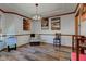 Dining room with wood-look flooring, decorative lighting, and stylish wall art at 286 N Greenbriar Dr, Greenwood, IN 46142