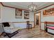 Dining area featuring wood-look floors, stylish lighting, and convenient access to other rooms at 286 N Greenbriar Dr, Greenwood, IN 46142